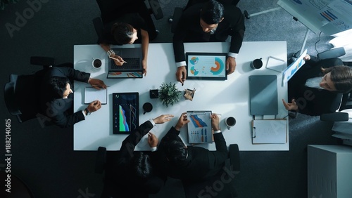 Time lapse of diverse marketing team prepare for business meeting. Top down aerial view of businesspeople placed laptop and tablet with financial statistic at table. Creative business. Directorate.