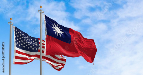National flags of Taiwan and USA waving in the wind on a clear day