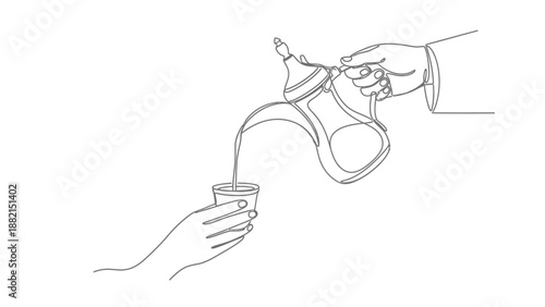 hand pouring tea from teapot