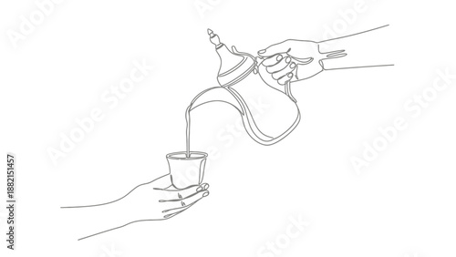 hand pouring tea from teapot