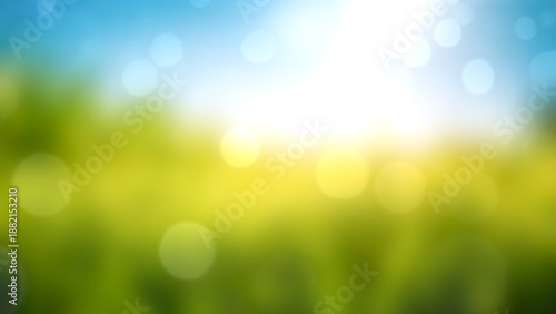 Sunny spring meadow blur background, blue sky to green grass gradient