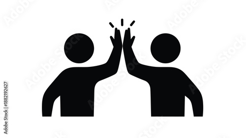 Two people giving each other a high five a celebratory moment silhouette