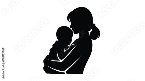 A tender moment mother holding baby in a dark silhouette
