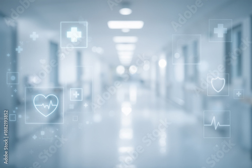 Blurred hospital corridor with icons representing medical and healthcare symbols floating across the scene in a cool blue tone