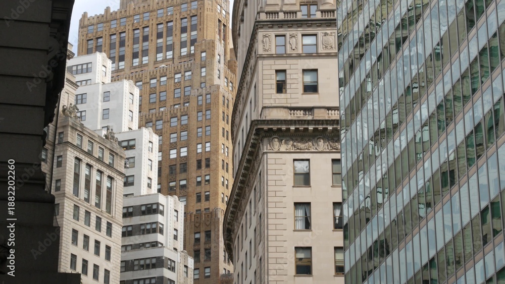 Fototapeta premium New York City Lower Manhattan Downtown Financial District, Broadway street, United States. Building architecture near Bowling Green from Battery Park. Urban cityscape of FiDi. American business center