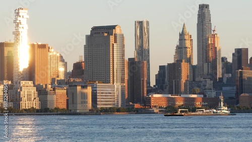 Wallpaper Mural New York City Manhattan Downtown Financial District skyline, United States of America. Skyscraper tower buildings in FiDi. Modern business center cityscape from New Jersey. Sunset golden hour, Hudson. Torontodigital.ca