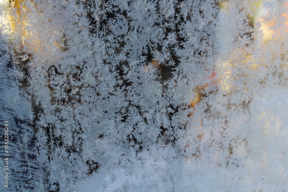 Fototapeta premium Frost patterns on frozen window glass