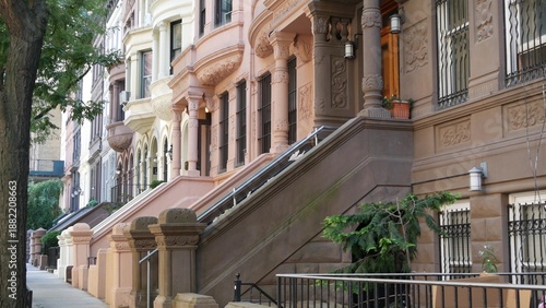 Wallpaper Mural New York City townhouse buildings, brownstone row houses in Manhattan or Brooklyn, United States of America. Classic buildings on residential district street. Real estate property. Rowhouse townhome. Torontodigital.ca