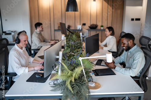 Tableau sur toile Diverse business people working in modern office environment
