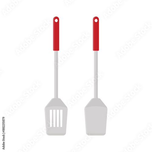 A professional set of essential steel and plastic kitchen utensils including a fork, spoon, and spatula isolated on a white background for domestic cooking and food preparation