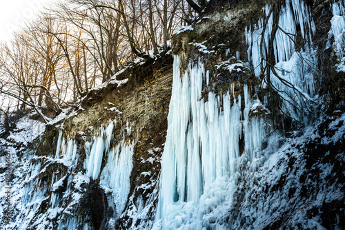 Photography Winter landscape showcasing an Icefall on a river cliff at Rudawka Rymanowska