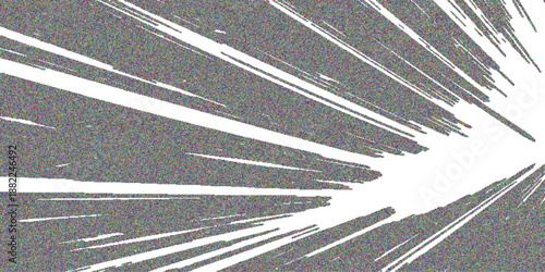 Abstract grunge black and white background featuring a motion blur of traffic and light streaks on a high speed city highway asphalt road