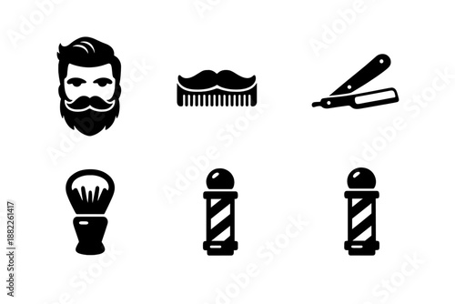 Classic barbershop grooming tools and accessories set including razor, shaving brush, and barber pole