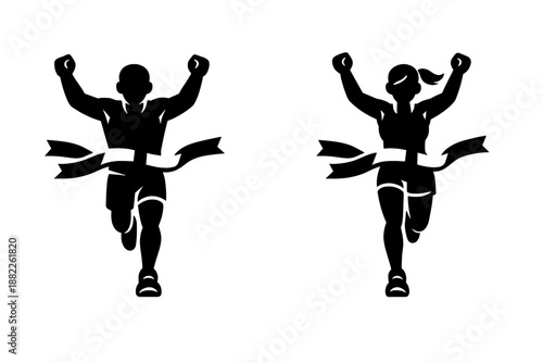Male and female runners crossing the finish line with arms raised in victory celebration