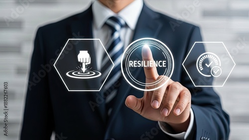 Businessman interacting with resilience icons on digital interface