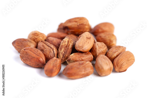 Hazelnuts kernels on a white background, healthy food. Macro