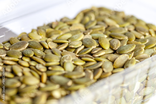 Pumpkin seeds isolated on white background. food