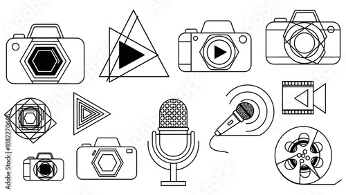 A professional photographer capturing a high-angle lifestyle shot of a creative workspace with a digital camera on a tripod in a bright modern studio