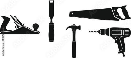 Collection of carpentry tools showing saw and drill