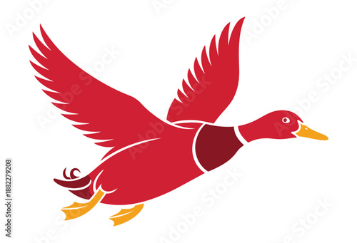 A red duck in flight with yellow beak and feet