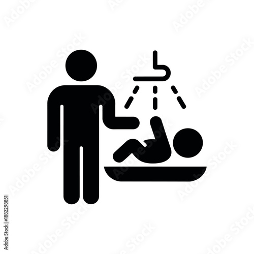 A man giving a baby a bath in a sink with warm water