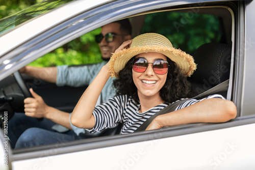 Fotografie Smiling middle-eastern lovers millennial handsome man and pretty long-haired wom