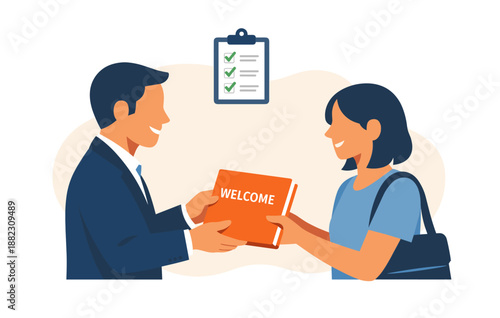 Caucasian male and female adults exchanging welcome book in office setting
