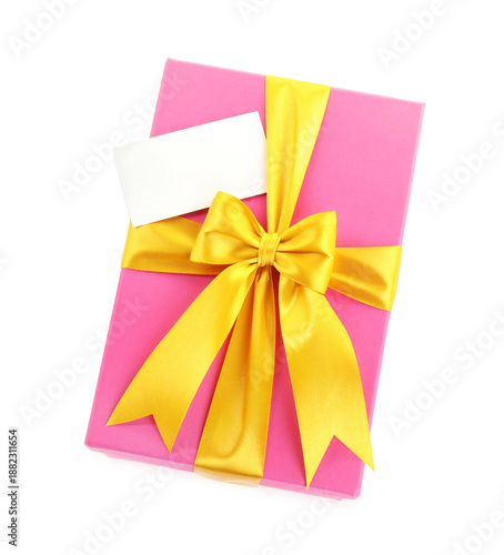 Beautiful wrapped gift with blank card isolated on white, top view