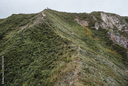 Hiking along the Sea of Japan coastline while traveling through the remote landscapes of Russia’s Far East region, adventure experience.