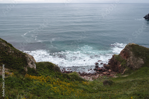 Hiking along the Sea of Japan coastline while traveling through the remote landscapes of Russia’s Far East region, adventure experience.