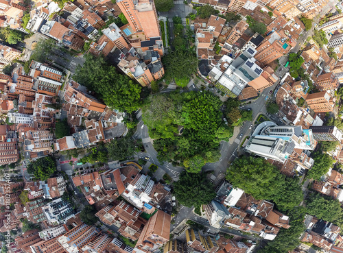 Medellin, Antioquia, Colombia - January 9, 2026. Aerial view of the second Laureles Park, an urban green space surrounded by residential architecture and tree-lined streets.