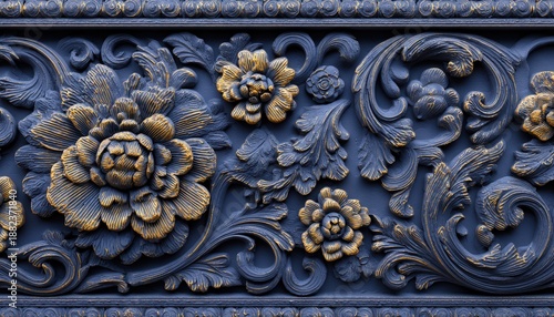 Intricate floral relief carving displays ornate details in contrasting blue and gold tones