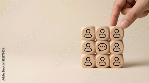 Wallpaper Mural wooden blocks with people icons and hand Torontodigital.ca