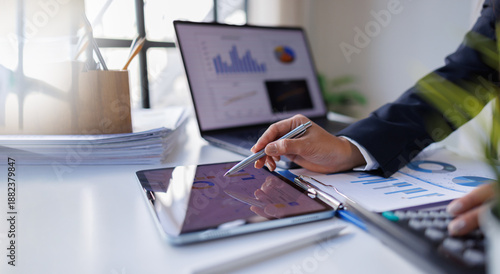 Business professional investor working new start up project. tablet laptop computer with digital marketing media in virtual icon design Finance managers meeting.
