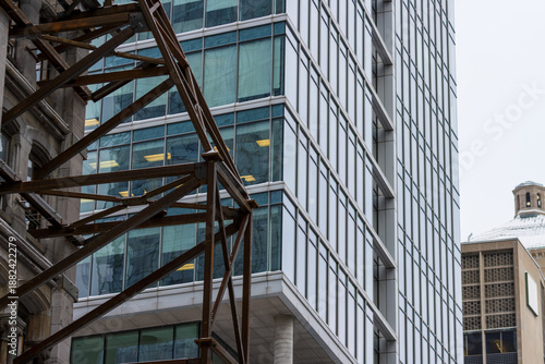 Canada, Montreal, 24 December 2025 : Modern architecture meets historical construction amid urban development coexistence