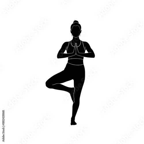 Woman Practicing Yoga in Tree Pose with Hands Together.