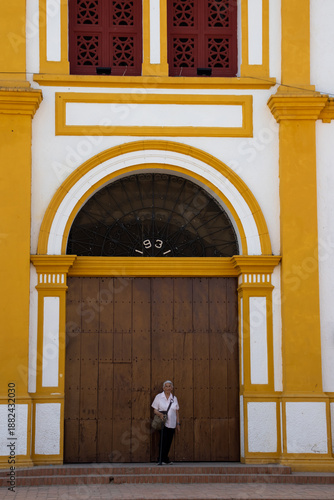 Wallpaper Mural Senior woman at the historical Church of the Immaculate Conception built in 1843 in the beautiful Heritage Town of Mompox in Colombia Torontodigital.ca