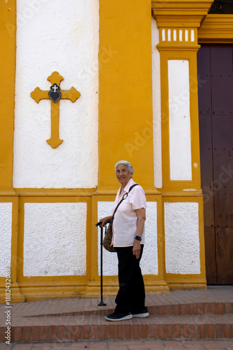 Wallpaper Mural Senior woman at the historical Church of the Immaculate Conception built in 1843 in the beautiful Heritage Town of Mompox in Colombia Torontodigital.ca