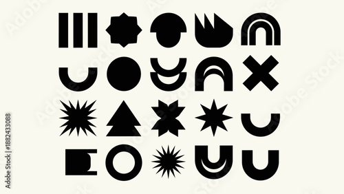 A collection of various black geometric shapes and symbols on a plain background, viewed directly from above