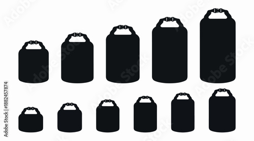 Collection of various sized black dry bags for outdoor activities.