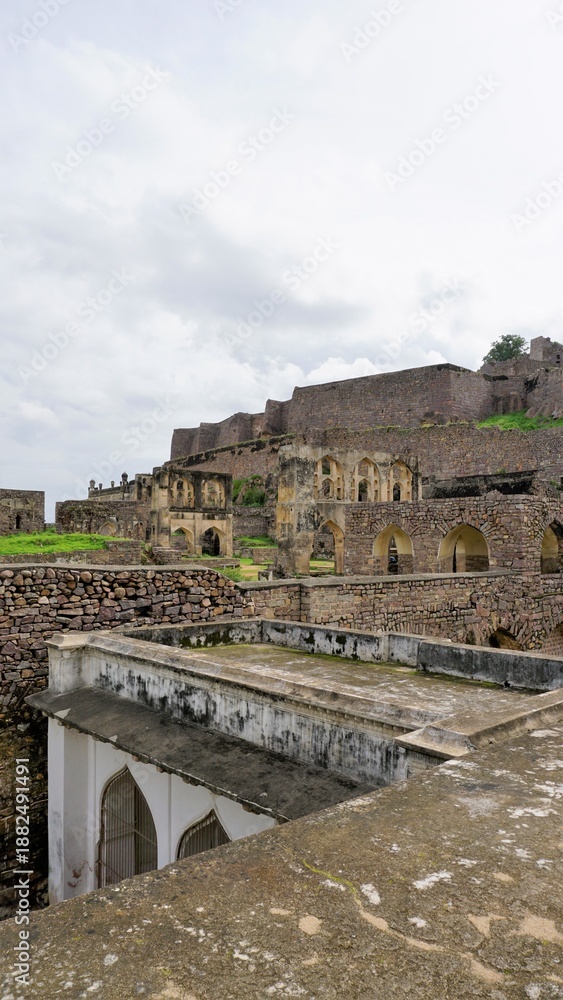 Fototapeta premium Amazing portrait historical scenic fortified citadel architecture of Golconda fort.