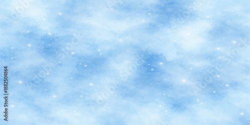 A beautiful abstract blue sky winter background with white fluffy clouds and bright sunlight shining through a clear nature atmosphere