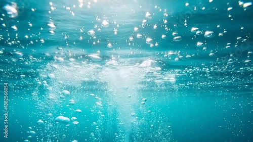 Underwater bubbles in blue water