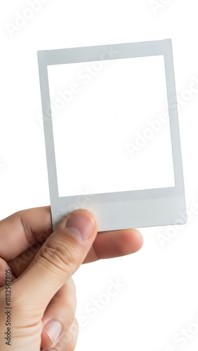 Hand holding polaroid frame isolated on transparent background