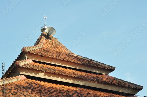 Wallpaper Mural Traditional Indonesian Mosque Roof with Loudspeaker and Blue Sky Torontodigital.ca