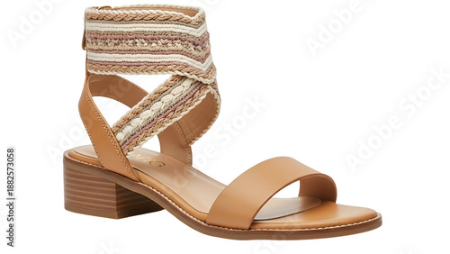 Tan leather sandal with ankle strap and block heel, woven detail, isolated on black