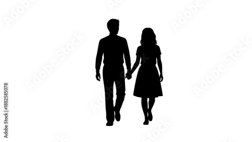Silhouette of a romantic young couple walking and holding hands together.
