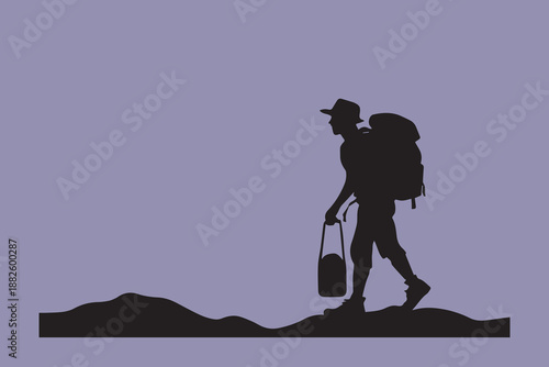 Silhouette of a hiker on a trail