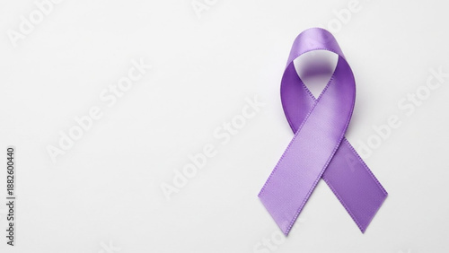 Purple awareness ribbon symbol representing support and solidarity for various causes isolated on a clean white background
