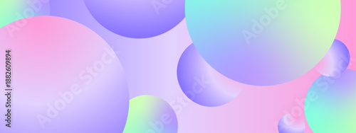Creative composition with various sized floating spheres in lavender pink and mint green tones